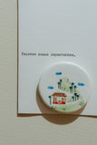 Imán decorativo Ilustrado en cerámica de 5 cm Tierra que abraza: Casa Campesina
