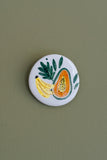 Imán decorativo Ilustrado en cerámica de 5 cm Tierra que abraza: Papaya y Banano